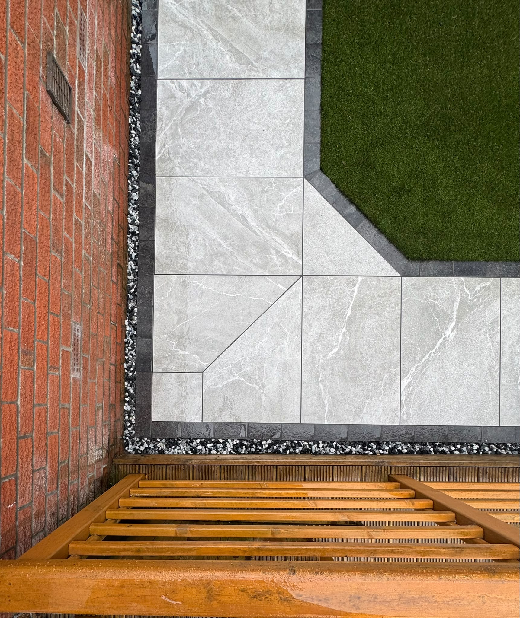 Overhead Grey Porcelain Slabs with Dark Border